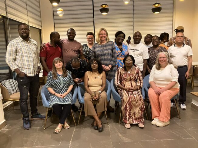 LSTM Alumni from Sierra Leone, in two rows smiling to camera