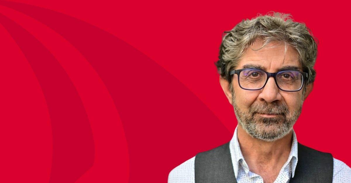 A picture of Professor Fouad Fouad, he is bearded and wearing glasses.