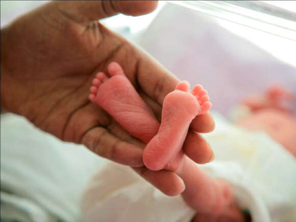 A premature baby is cared for in the pediatric ward at Yekatit Hospital in Addis Ababa. One in thirty-two babies in the developing world will die within their first month. The Ethiopian government has launched new programs to train community health workers on clean and safe delivery methods and early postnatal care for the mother and baby.