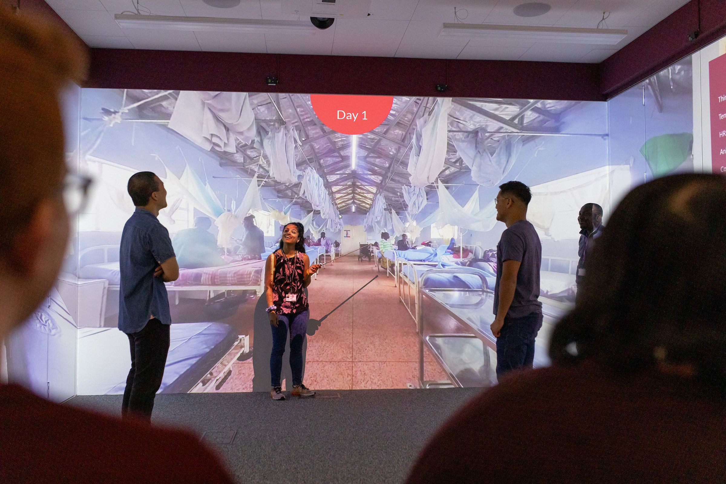 Photo of students at an open event using the LSTM immersive suite.