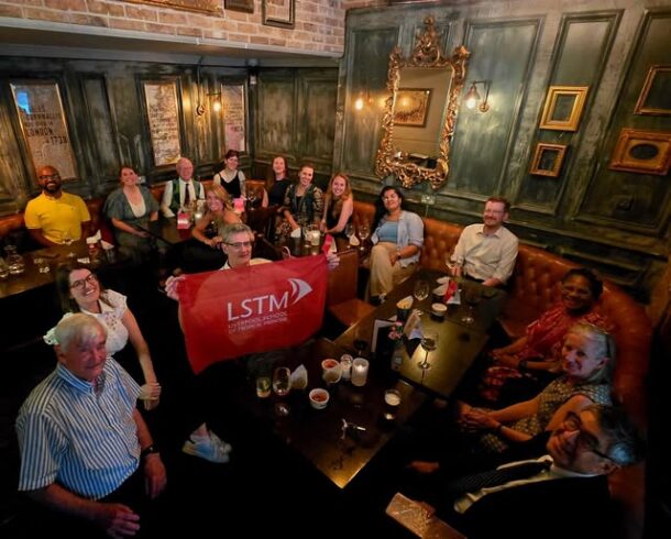 Image of a group of LSTM alumni at the London alumni reception in 2025.