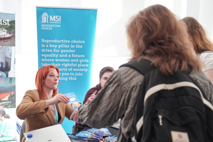 LSTM students speak with a representative from MSI Reproductive Choices at Careers Day 2026, exploring career opportunities in global health and reproductive healthcare.